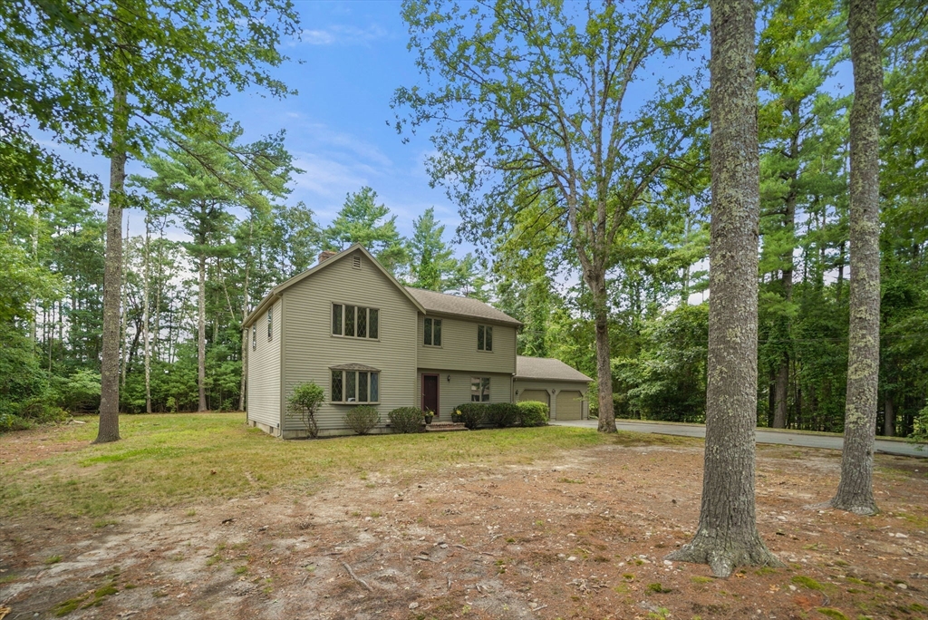 9 Randall Road Rochester, MA 02770 - Photo 38 of 42 a view of a house with a yard and large trees