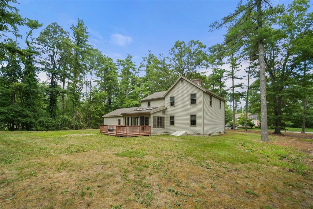 9 Randall Road Rochester, MA 02770 - Photo 39 of 42 a house with trees in the background