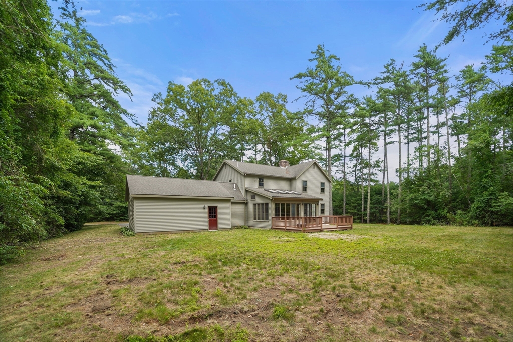 9 Randall Road Rochester, MA 02770 - Photo 41 of 42 a front view of house with yard and green space