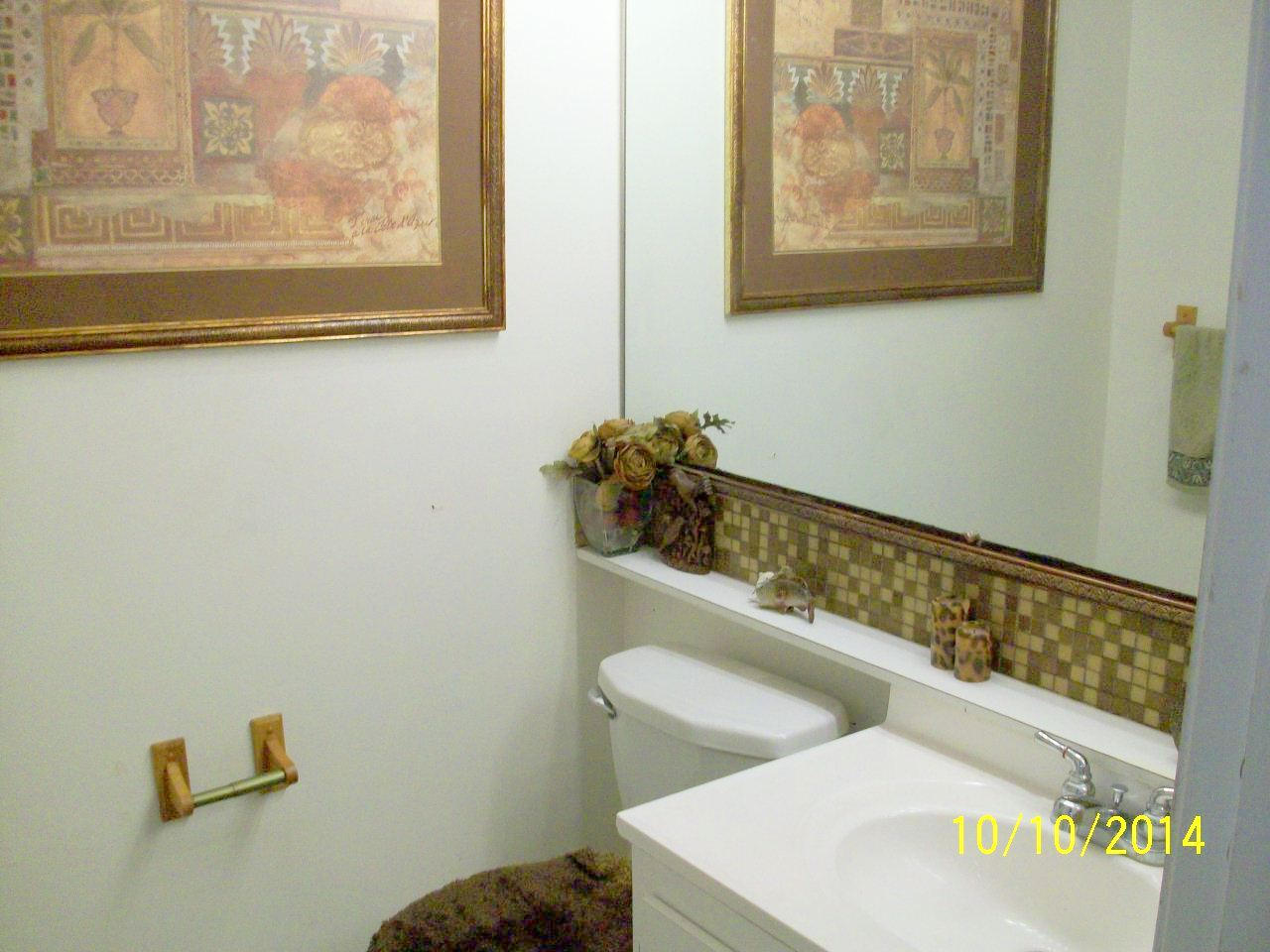 4667 Cherry Road West Palm Beach, FL 33417 - Photo 8 of 21 1st floor powder room