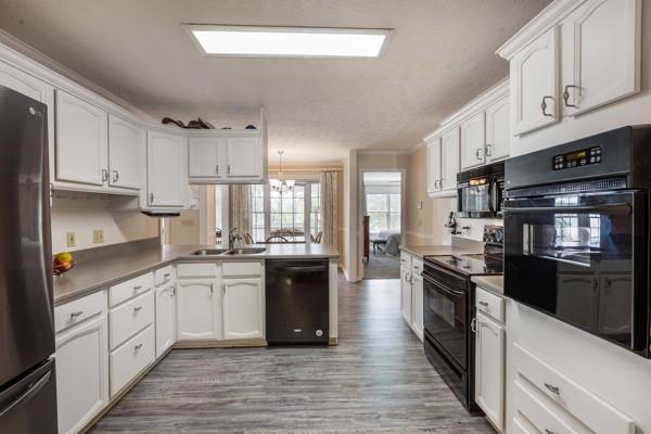 167 Edgewater Drive Temple, GA 30179 - Photo 7 of 37 a kitchen with stainless steel appliances granite countertop a stove top oven a sink dishwasher and a refrigerator