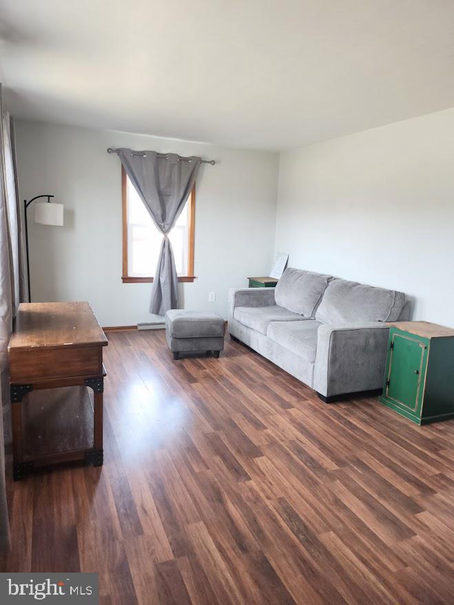 10314 Hyndman Road Manns Choice, PA 15550 - Photo 13 of 54 a living room with furniture and a wooden floor