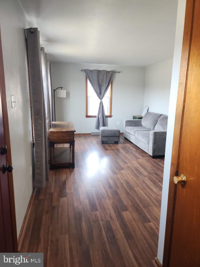 10314 Hyndman Road Manns Choice, PA 15550 - Photo 16 of 54 a living room with furniture and a wooden floor