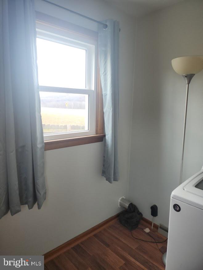 10314 Hyndman Road Manns Choice, PA 15550 - Photo 32 of 54 a room with a window and wooden floor