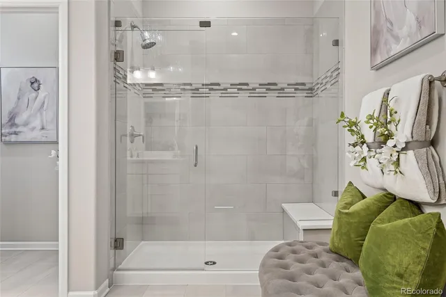 a bathroom with a shower and a toilet