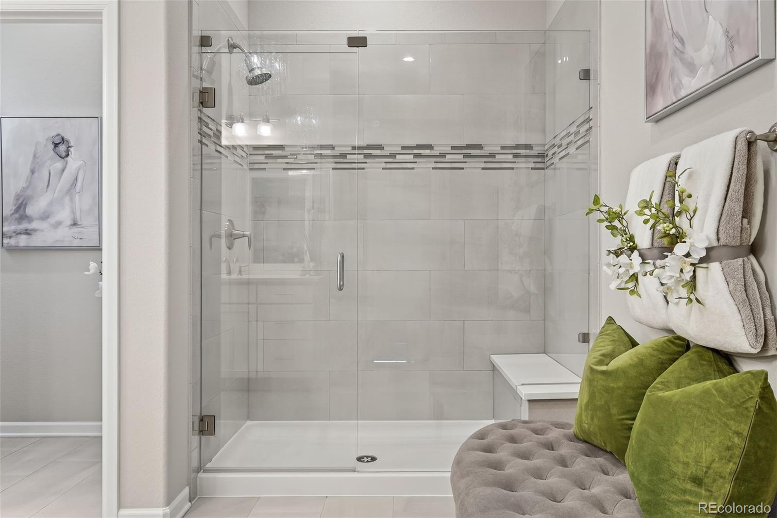 14094 Ivy Court Thornton, CO 80602 - Photo 16 of 44 a bathroom with a shower and a toilet