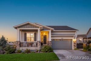 14094 Ivy Court Thornton, CO 80602 - Photo 2 of 44 a front view of a house with garden