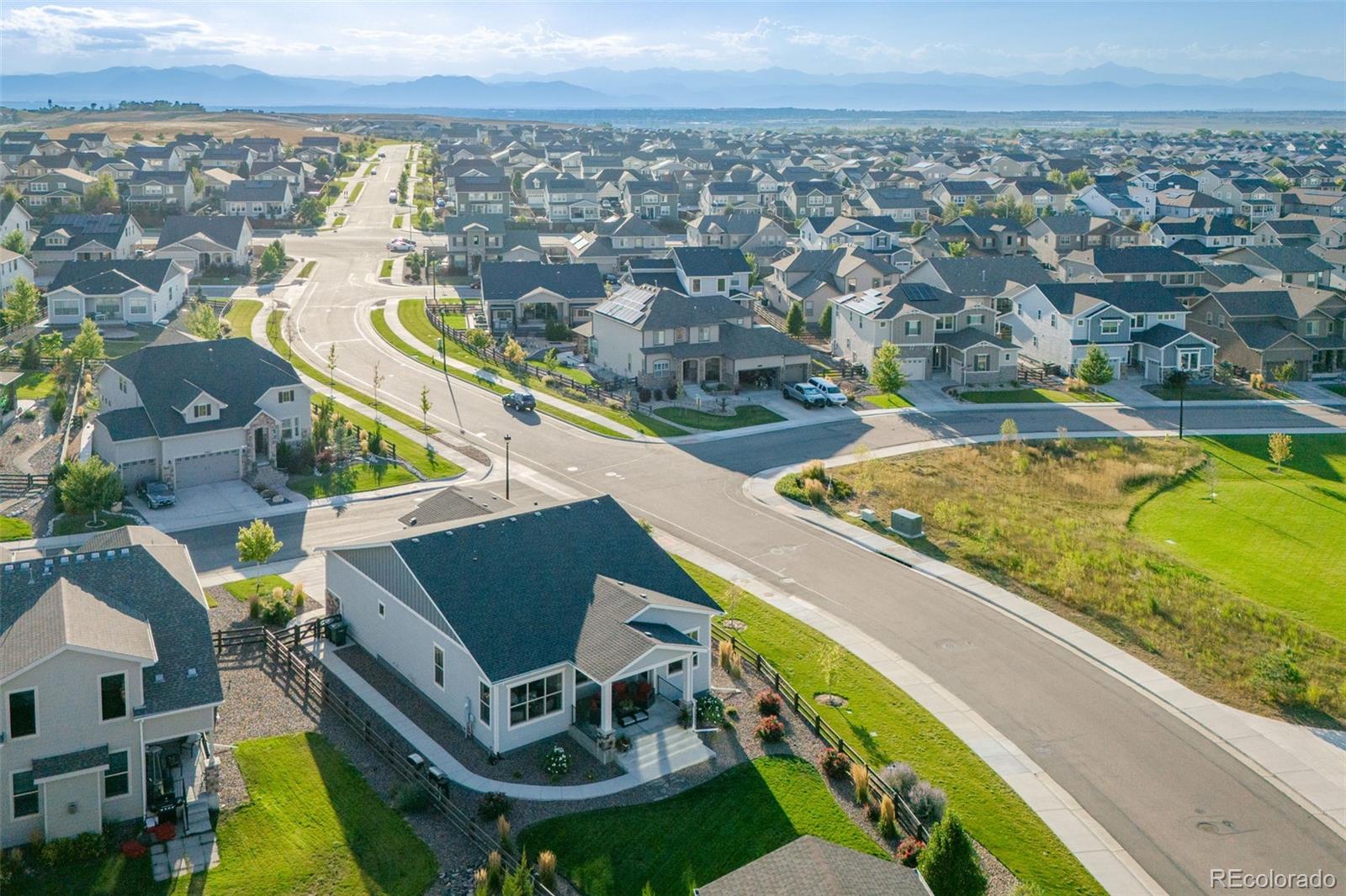 14094 Ivy Court Thornton, CO 80602 - Photo 36 of 44 an aerial view of residential houses with outdoor space and swimming pool