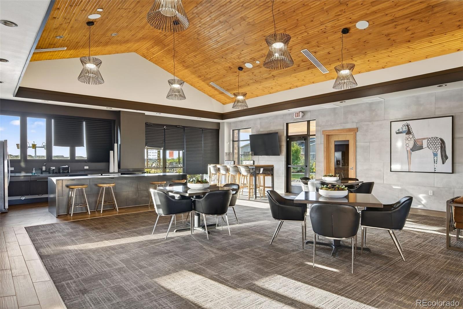 14094 Ivy Court Thornton, CO 80602 - Photo 39 of 44 a living room with furniture and a large window
