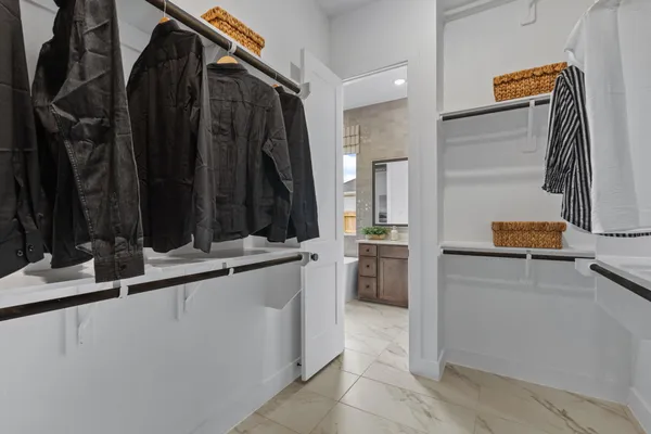 a bathroom with a sink double vanity and a mirror