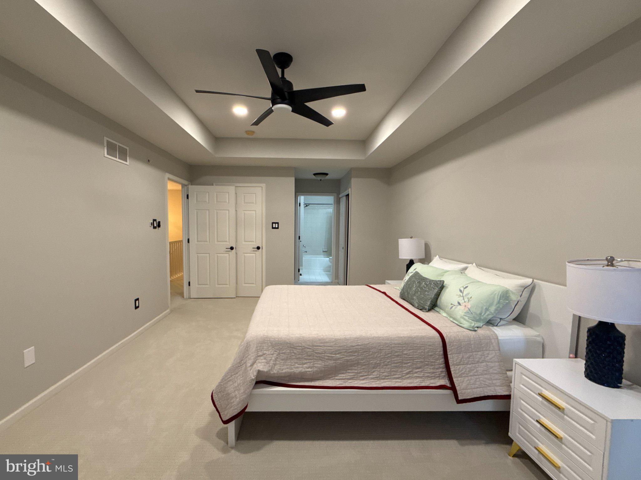 267 Flagstone Road, Unit 6 Chester Springs, PA 19425 - Photo 26 of 27 Serene bedroom with modern elegance.