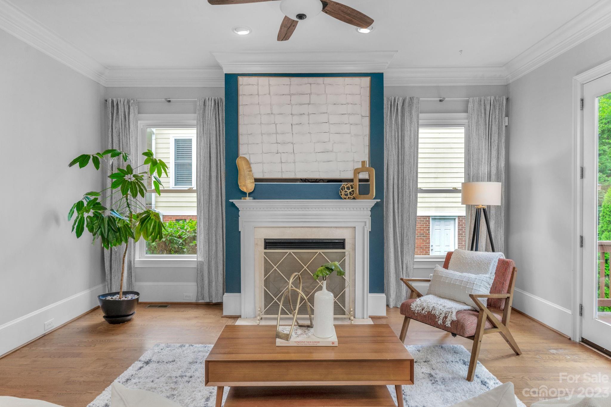 1320 Ivey Drive Charlotte, NC 28205 - Photo 13 of 45 a living room with furniture and a fireplace