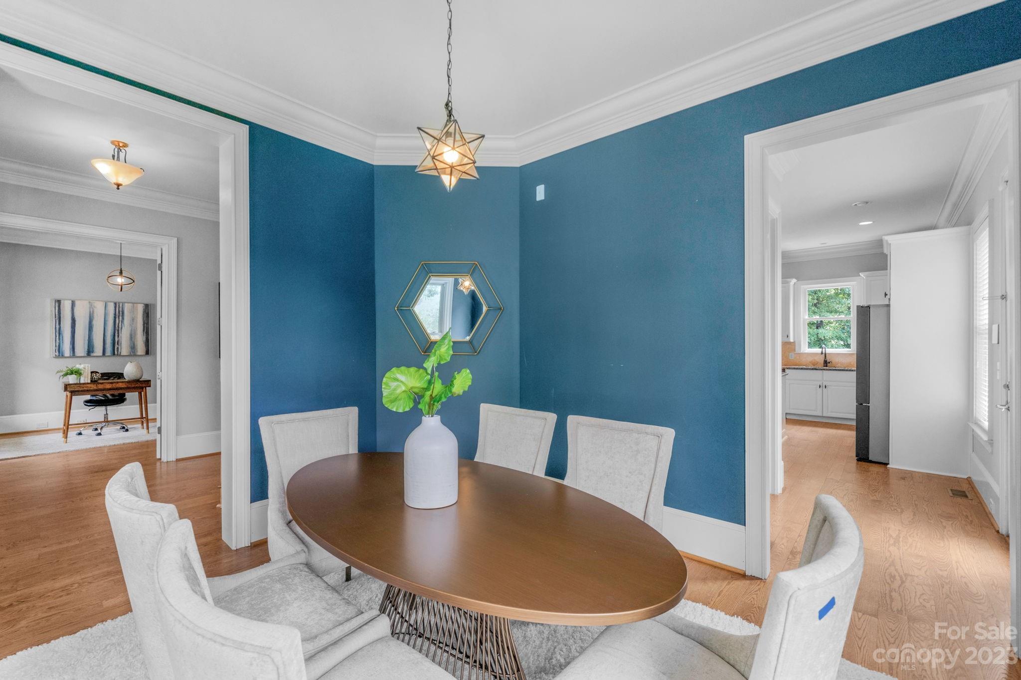 1320 Ivey Drive Charlotte, NC 28205 - Photo 10 of 45 a view of a dining room with furniture and wooden floor
