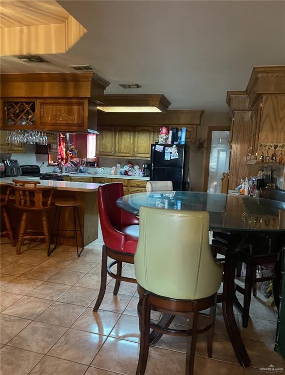 4249 Terra Street Rio Grande City, TX 78582 - Photo 5 of 6 a view of a dining room with furniture