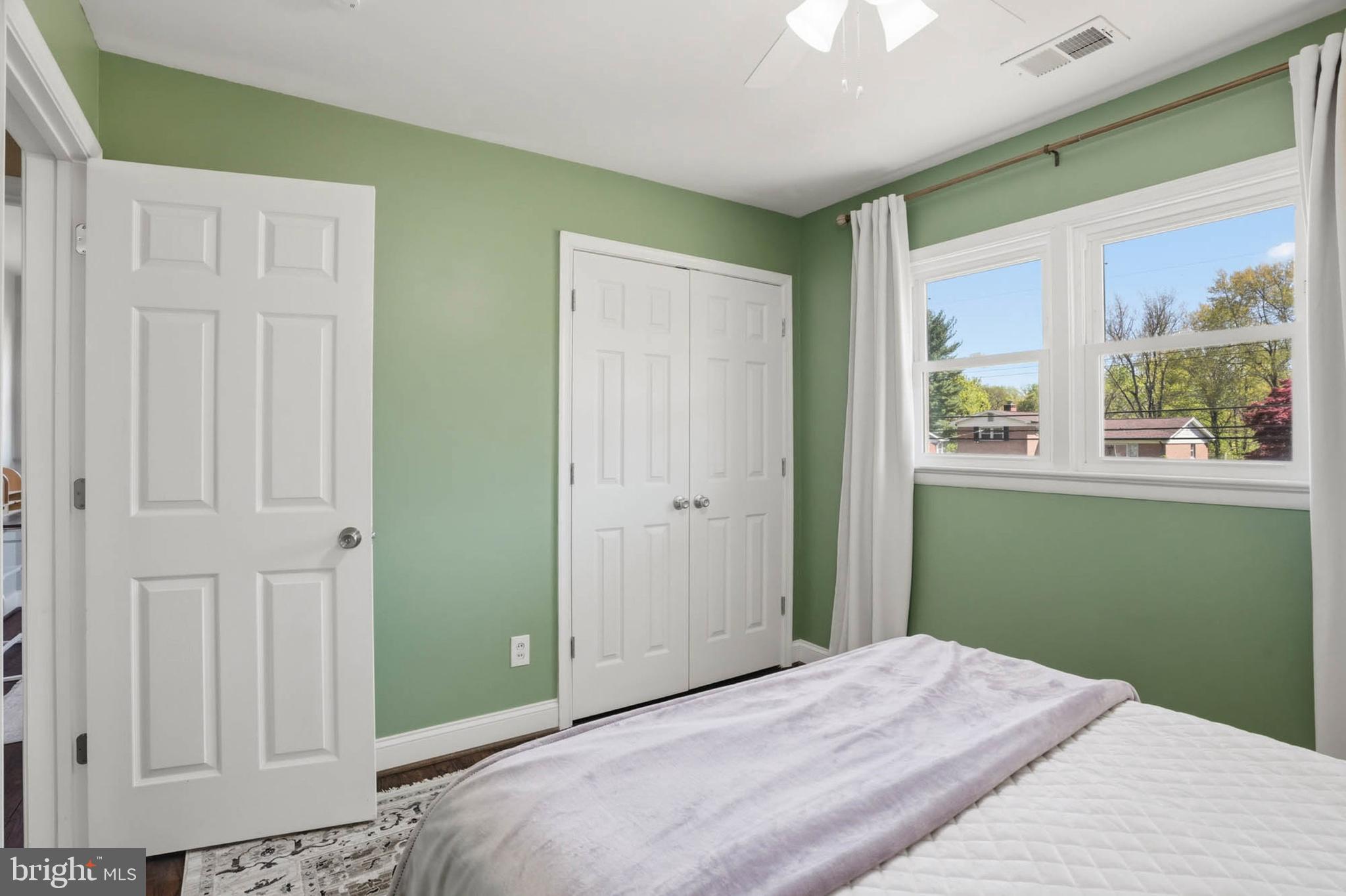 810 Venice Drive Silver Spring, MD 20904 - Photo 16 of 33 a bedroom with a bed and a window