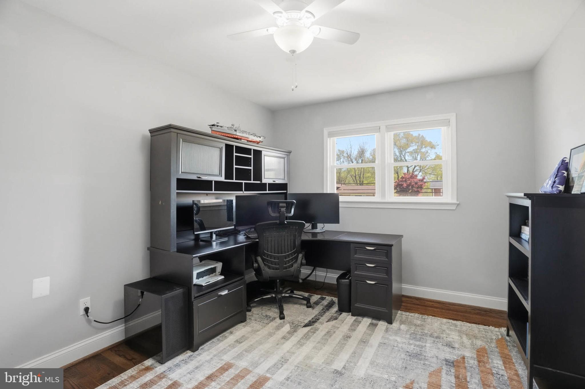 810 Venice Drive Silver Spring, MD 20904 - Photo 17 of 33 a view of a workspace with furniture and a window