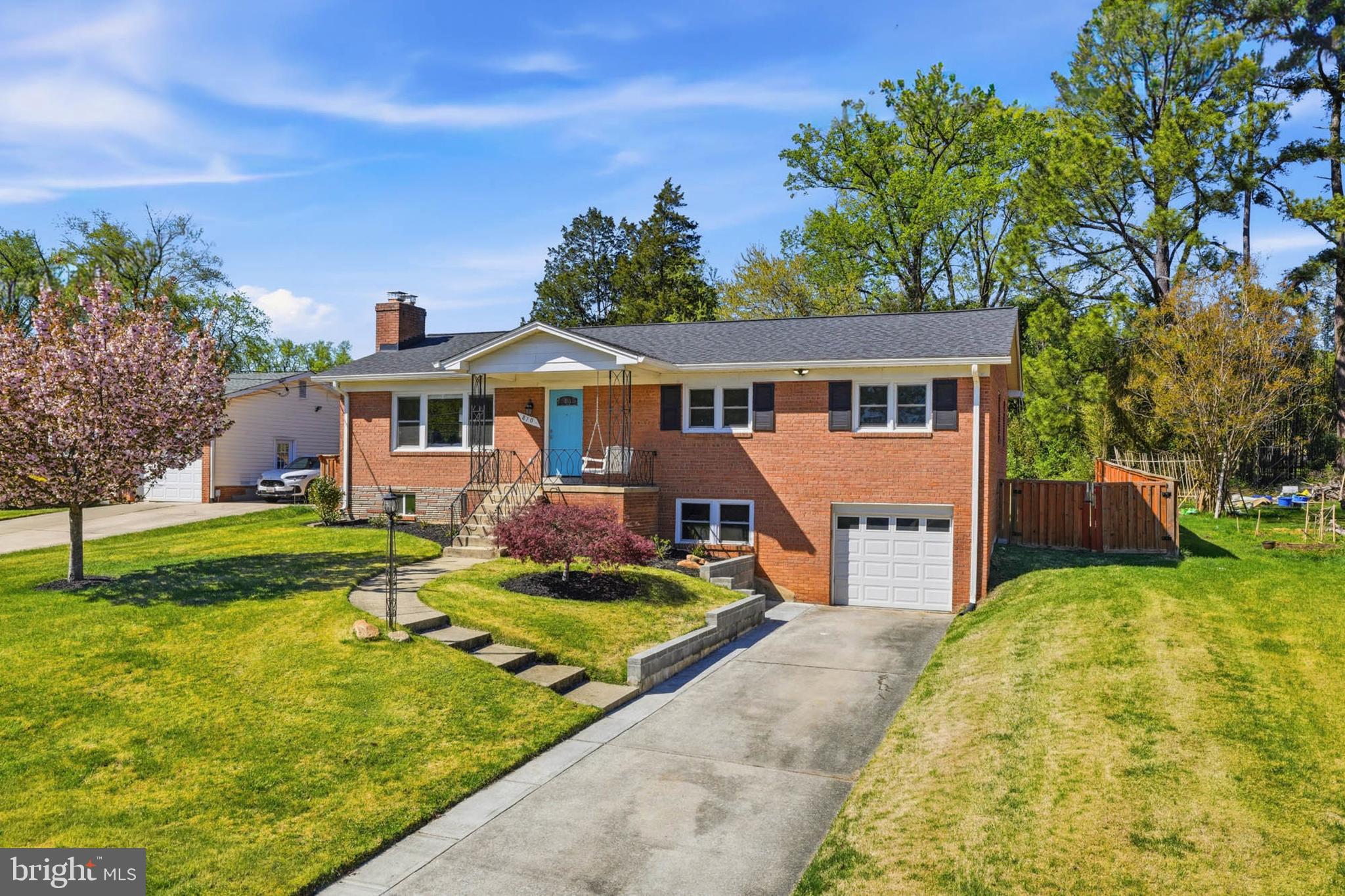810 Venice Drive Silver Spring, MD 20904 - Photo 2 of 33 a view of a house with garden and trees