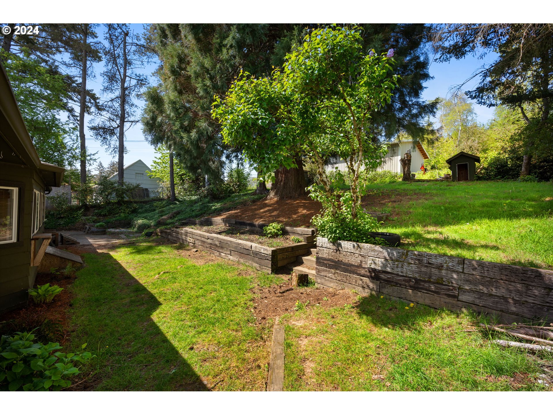 8511 Southeast Barbara Welch Road Portland, OR 97236 - Photo 25 of 30 a swimming pool with outdoor seating and yard