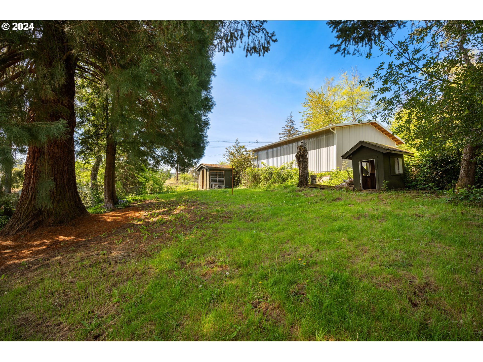 8511 Southeast Barbara Welch Road Portland, OR 97236 - Photo 26 of 30 a front view of a house with garden