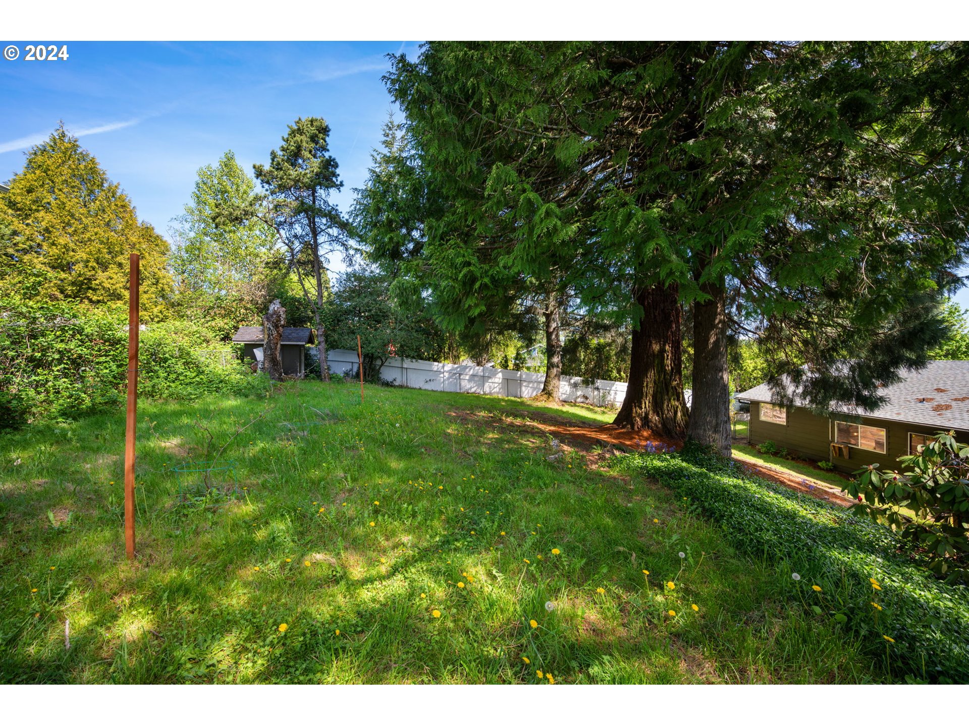 8511 Southeast Barbara Welch Road Portland, OR 97236 - Photo 27 of 30 a view of an outdoor space and a yard