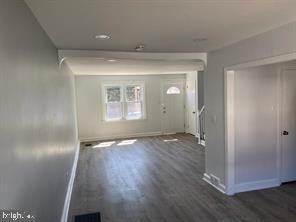 5822 Saul Street Philadelphia, PA 19149 - Photo 2 of 15 wooden floor in an empty room with a window