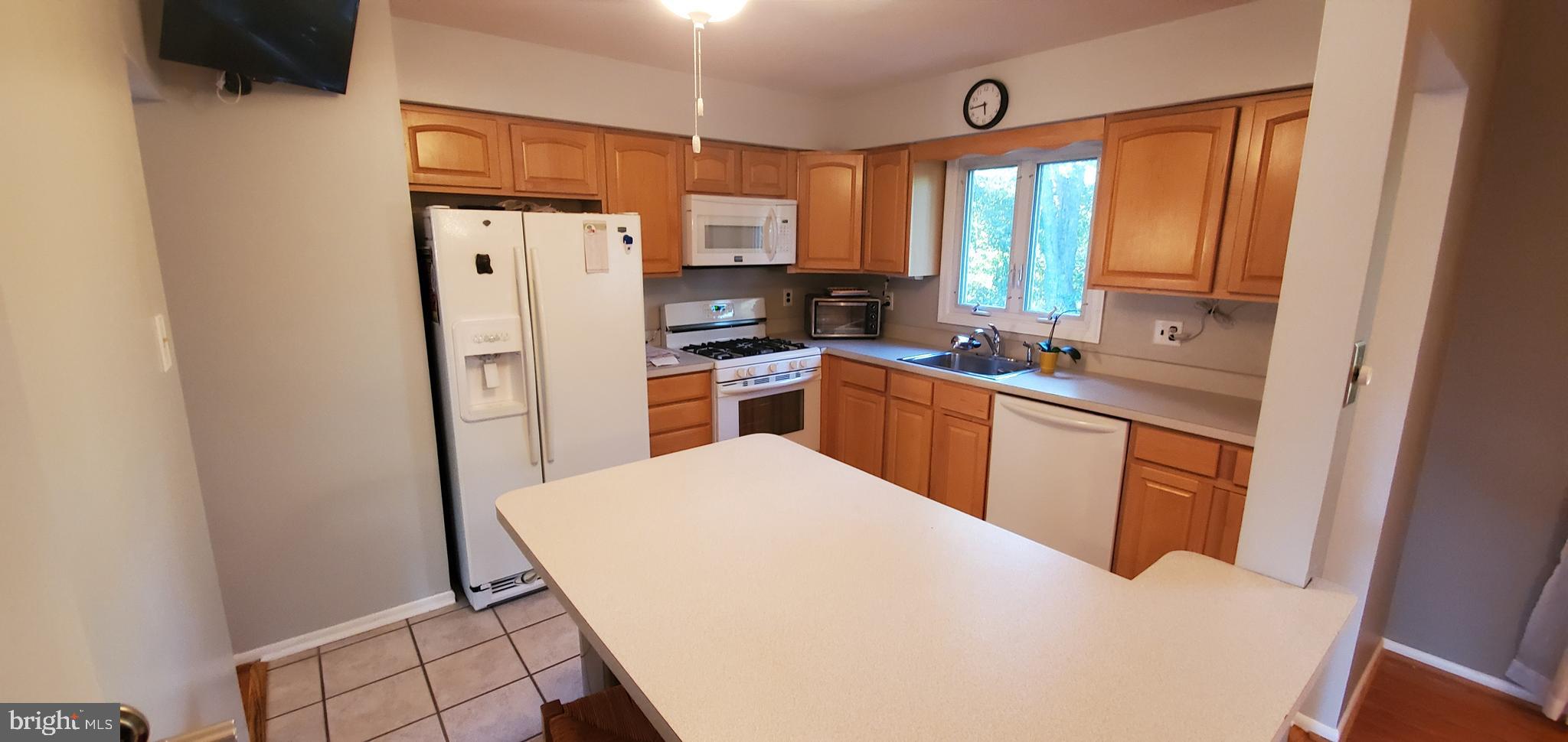 5 Crider Avenue Moorestown, NJ 08057 - Photo 19 of 64 a kitchen with stainless steel appliances a refrigerator and a sink