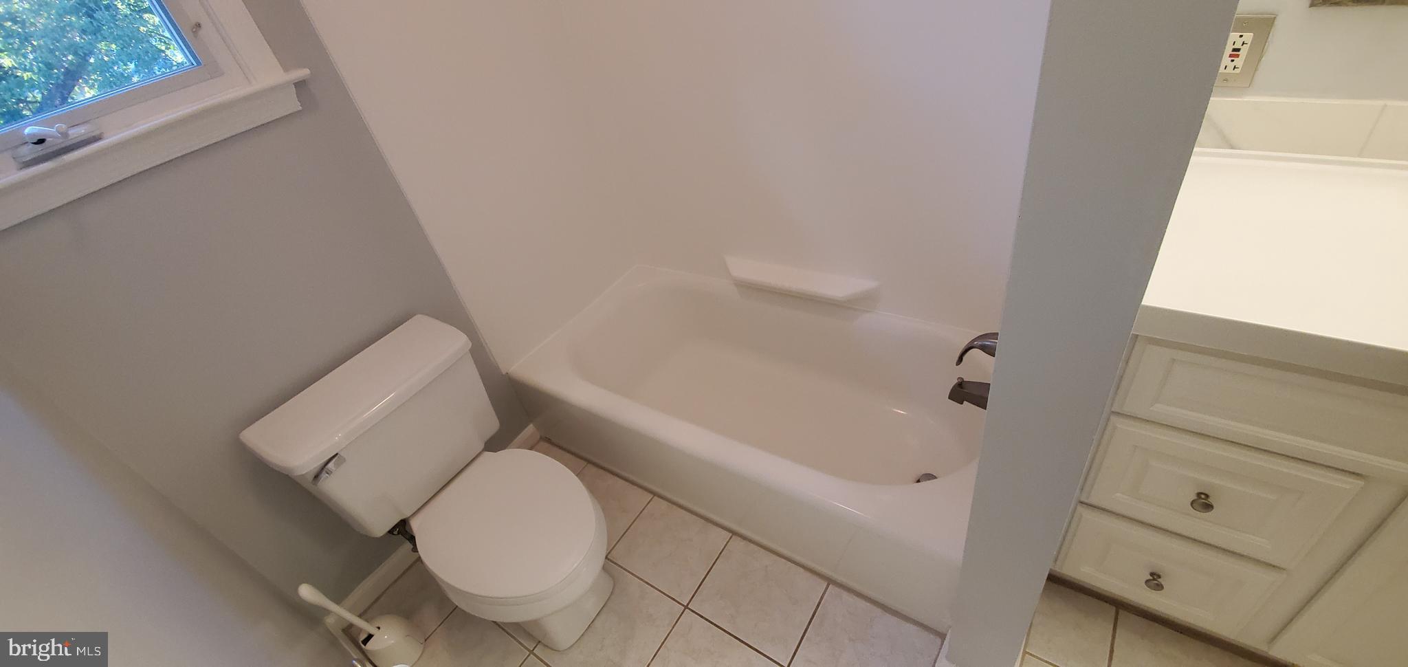 5 Crider Avenue Moorestown, NJ 08057 - Photo 25 of 64 a bathroom with a toilet and a bathtub