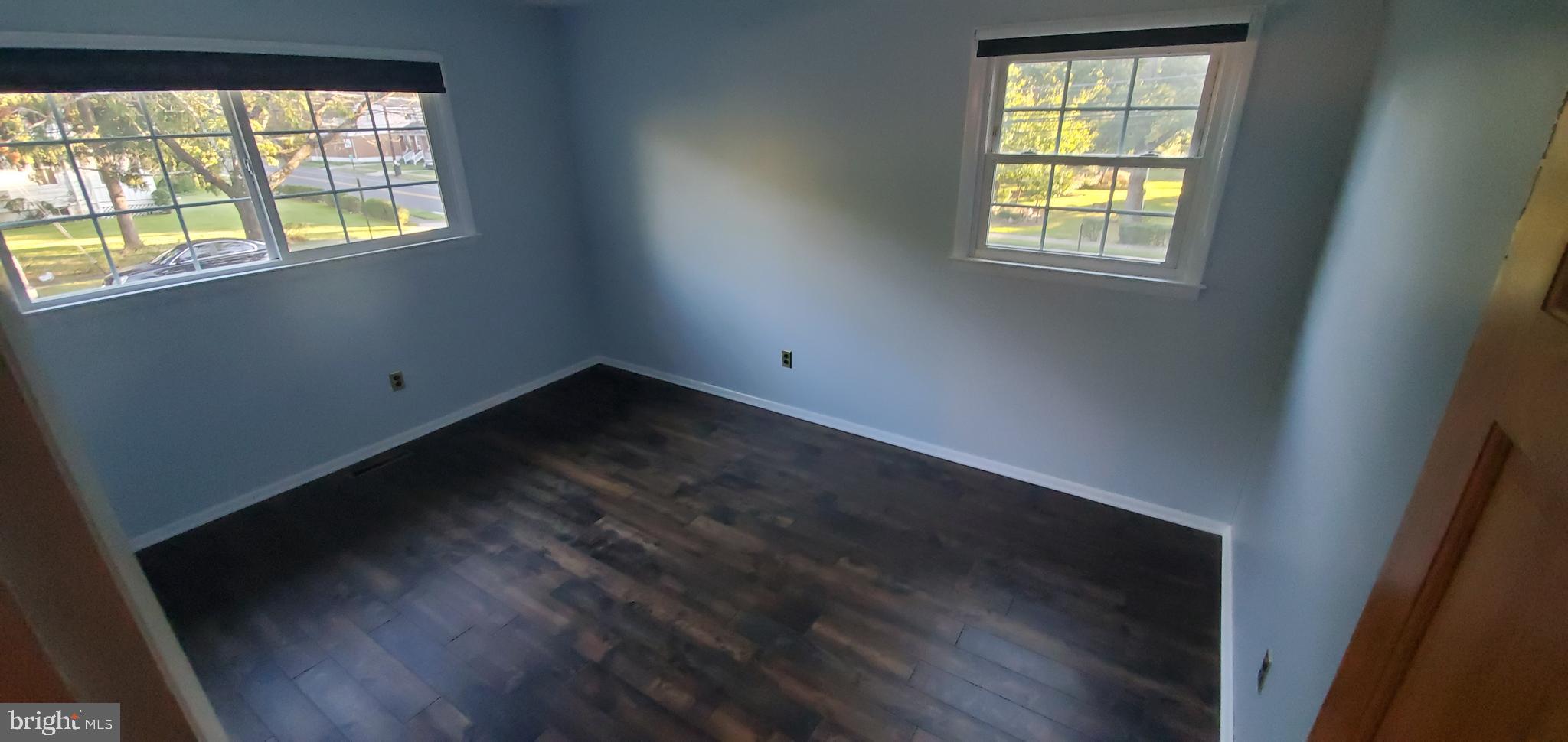 5 Crider Avenue Moorestown, NJ 08057 - Photo 33 of 64 an empty room with wooden floor and windows