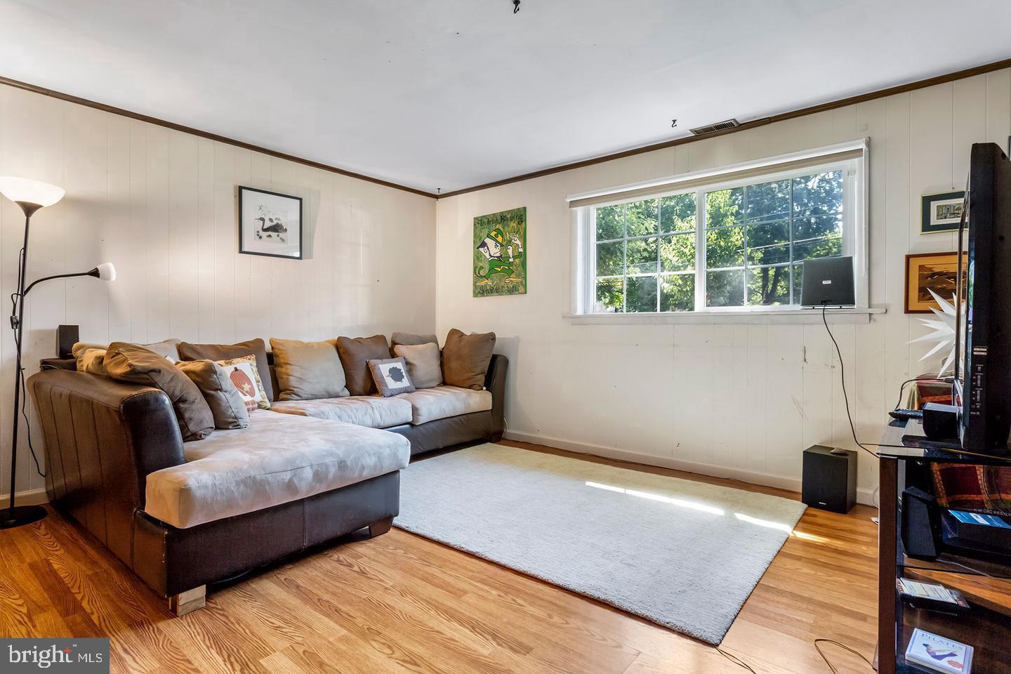 5 Crider Avenue Moorestown, NJ 08057 - Photo 44 of 64 a living room with furniture and a flat screen tv
