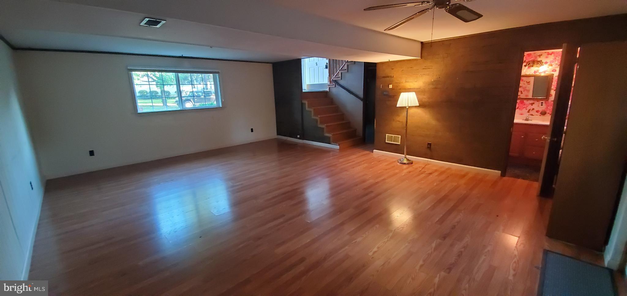 5 Crider Avenue Moorestown, NJ 08057 - Photo 47 of 64 an empty room with wooden floor and windows