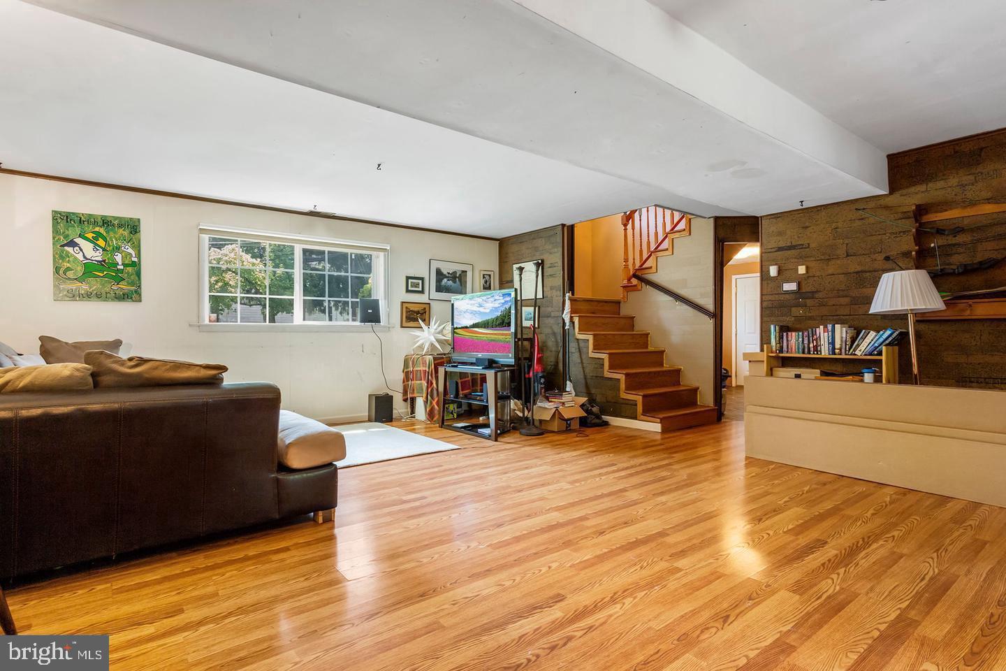 5 Crider Avenue Moorestown, NJ 08057 - Photo 48 of 64 a living room with furniture and a flat screen tv
