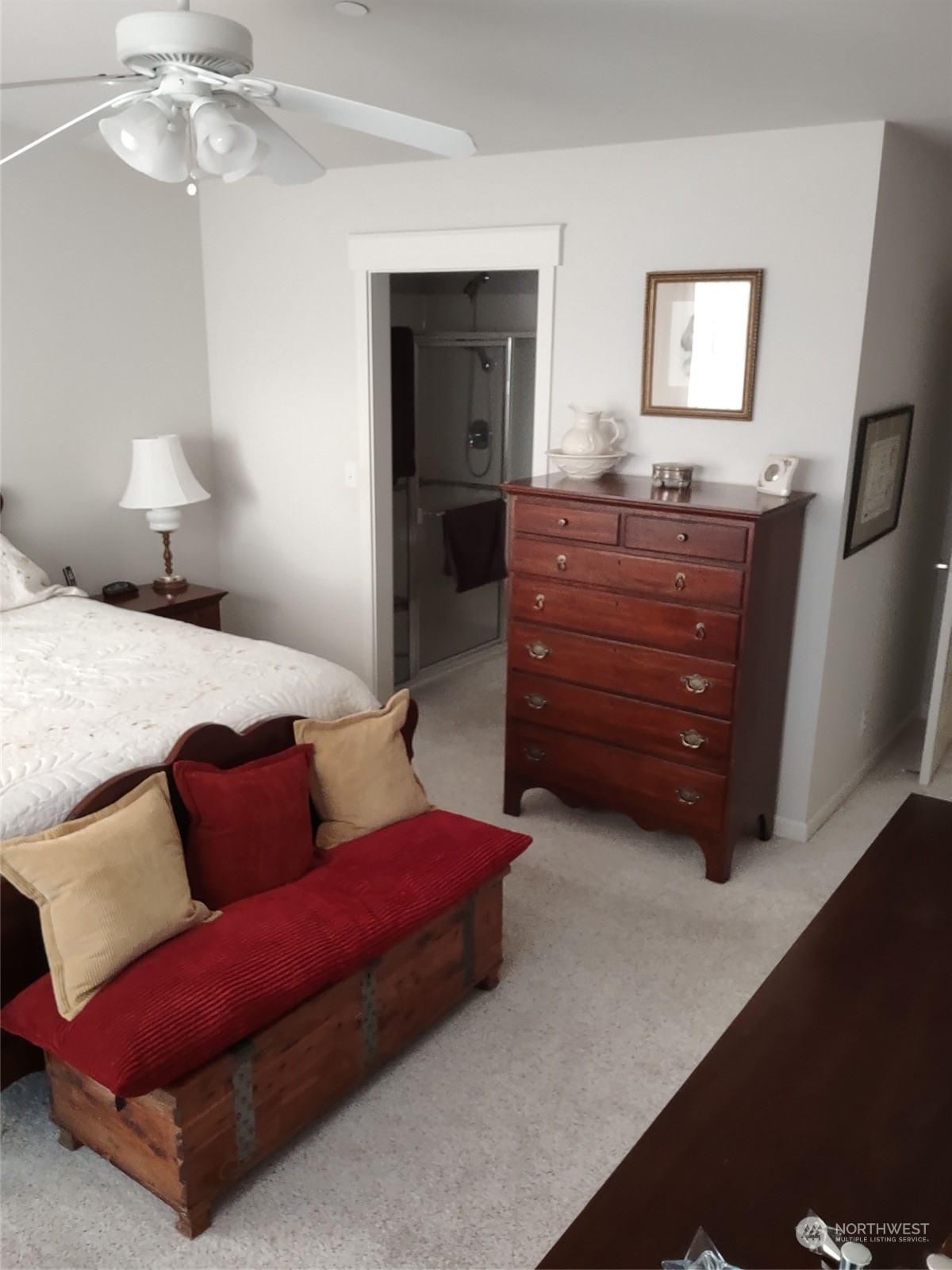 160 East Soderberg Road, Unit G19 Allyn, WA 98524 - Photo 26 of 38 a bedroom with a bed window and wall painting