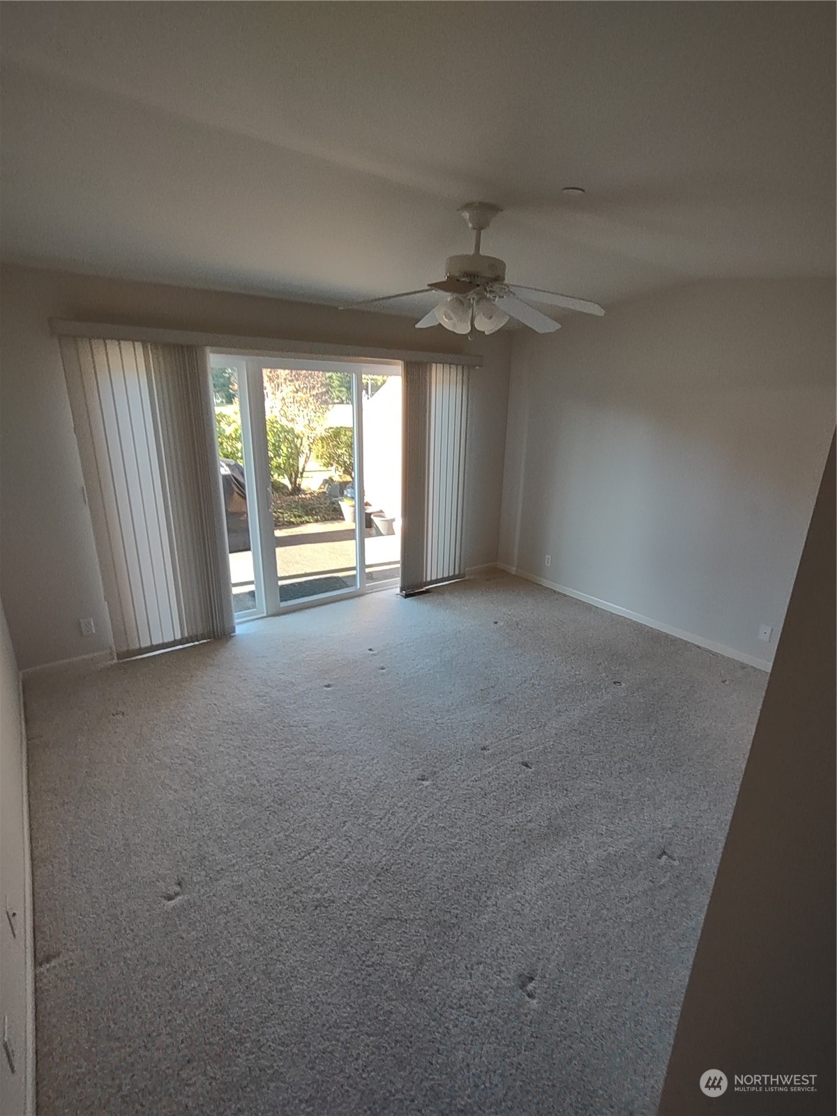 160 East Soderberg Road, Unit G19 Allyn, WA 98524 - Photo 28 of 38 an empty room with windows and fan