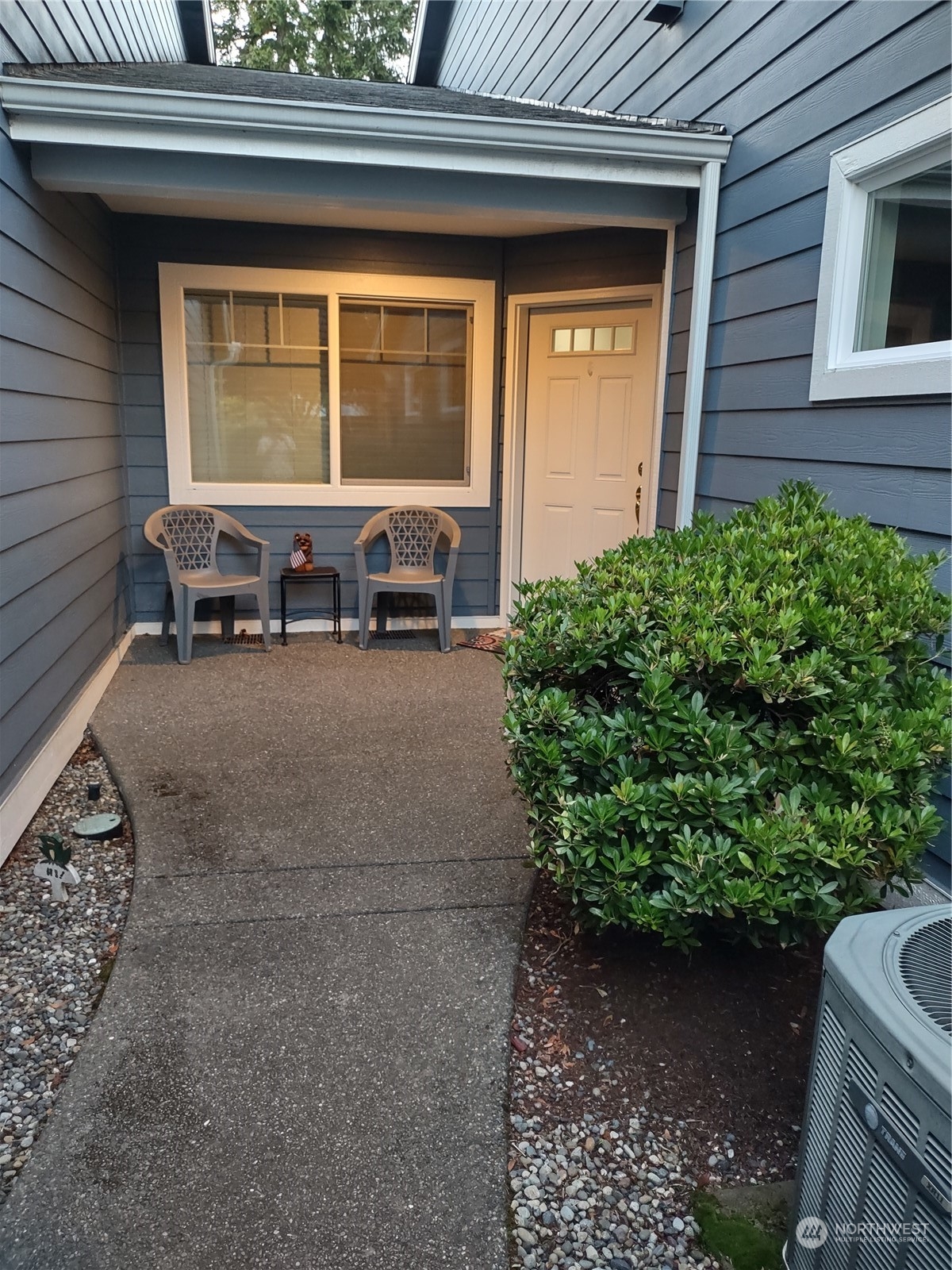 160 East Soderberg Road, Unit G19 Allyn, WA 98524 - Photo 37 of 38 a view of a house with a patio