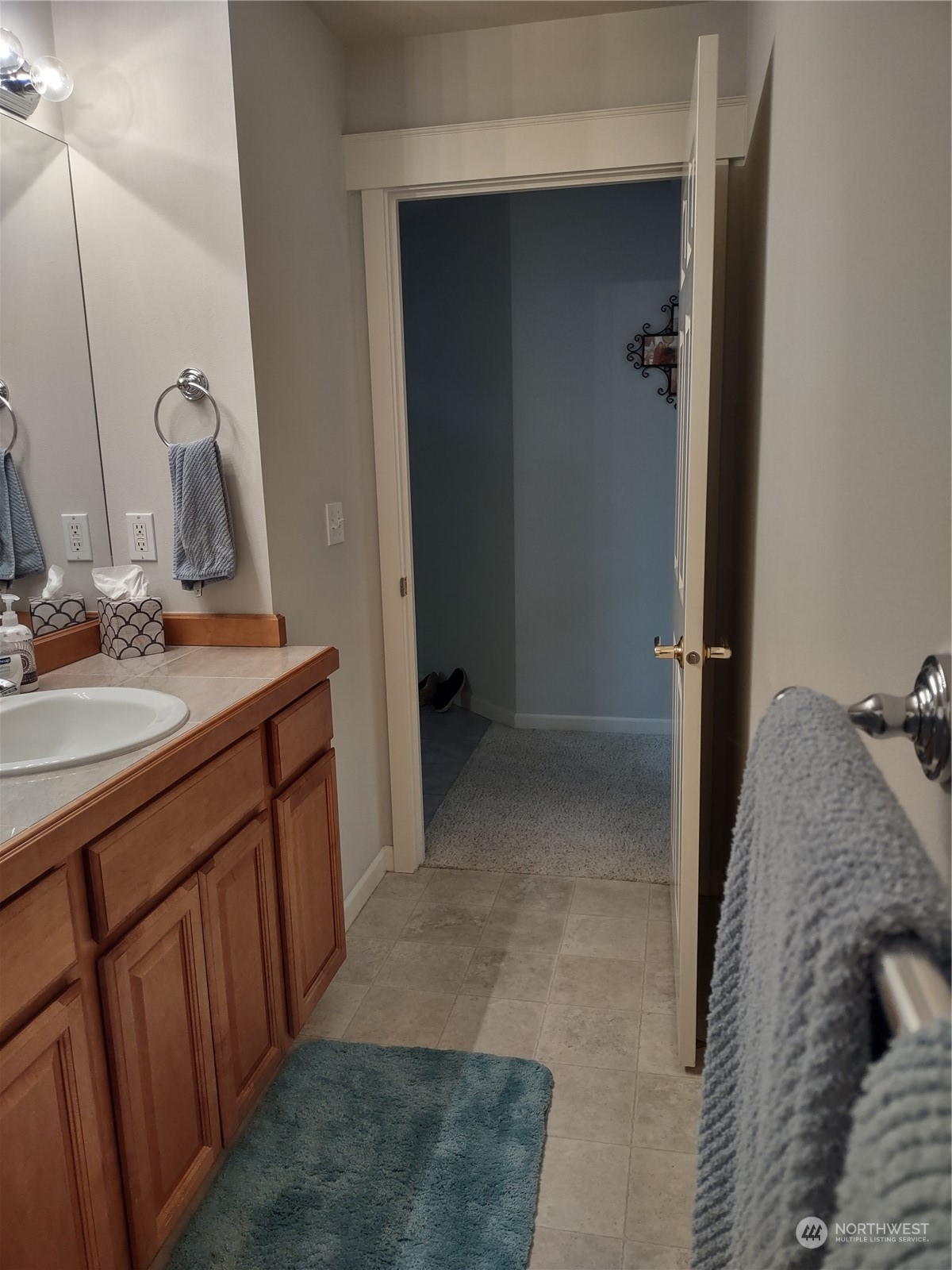 160 East Soderberg Road, Unit G19 Allyn, WA 98524 - Photo 7 of 38 a bathroom with a sink and mirror