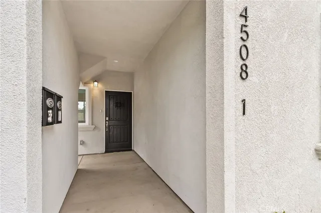 a view of a hallway with closet