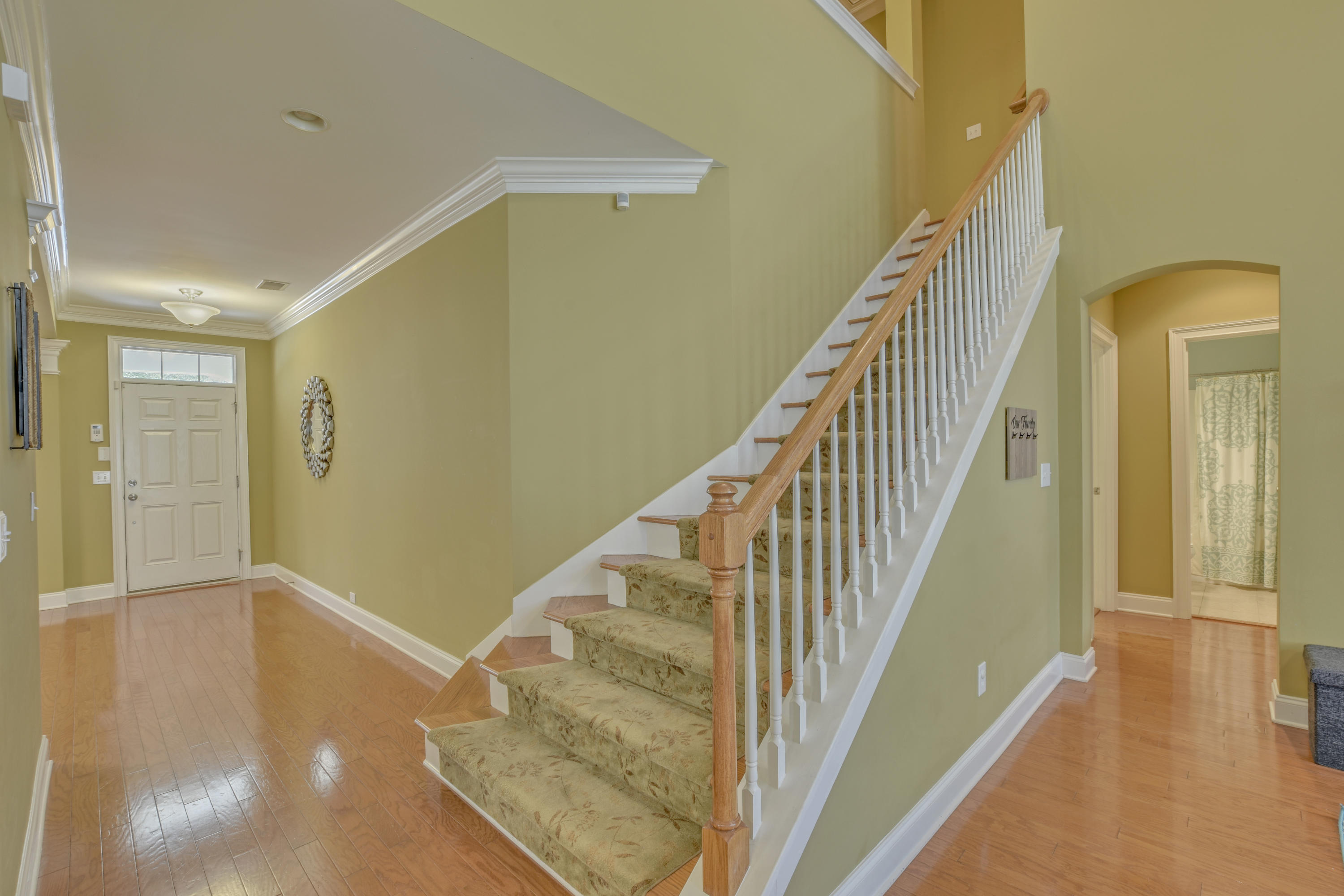 116 Ashley Bluffs Road Summerville, SC 29485 - Photo 14 of 64 Foyer with gleaming hardwood floors thro