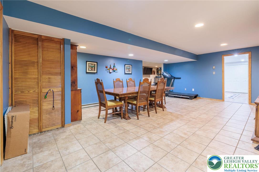 2170 Clearview Road Coplay, PA 18037 - Photo 51 of 75 This versatile basement space offers an ideal setting for casual meals and active pursuits.