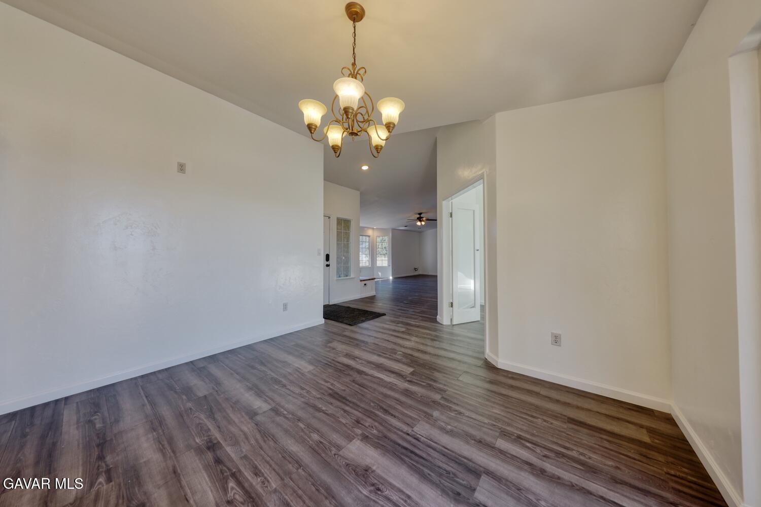 26801 Cabriolet Court Tehachapi, CA 93561 - Photo 17 of 60 a view of a room with wooden floor