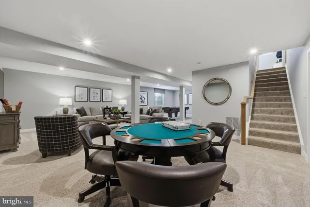 a room with furniture and a rug