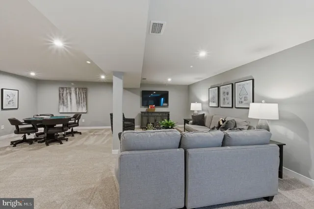 a living room with furniture and a couch