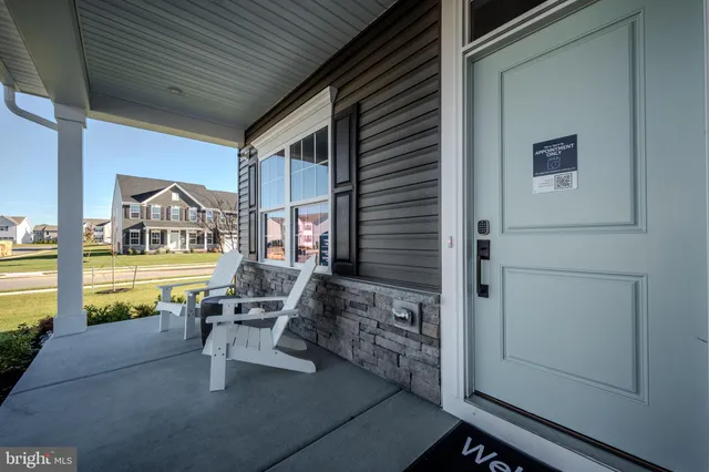 a front view of a house with swimming pool