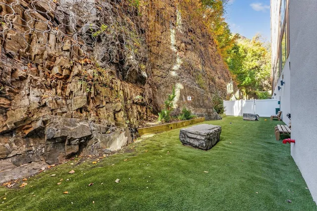 a view of a yard with furniture