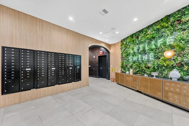a view of entryway with a yard and garage