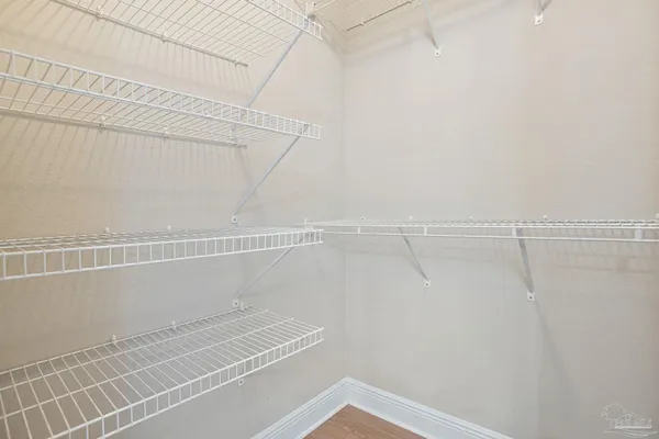 a view of a room with racks on the wall