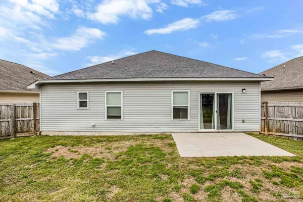 a house with yard in front of it