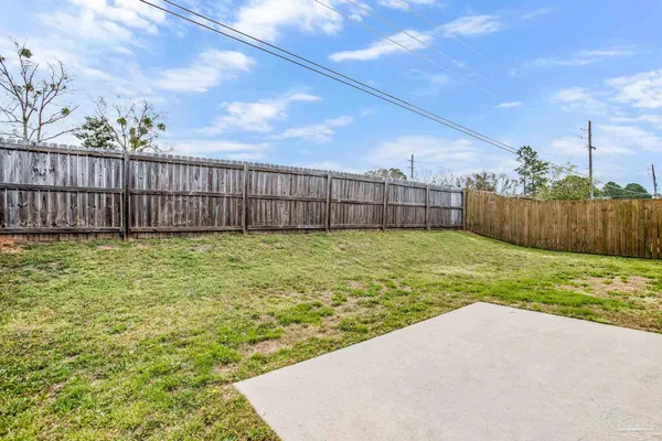a view of a backyard with a small yard