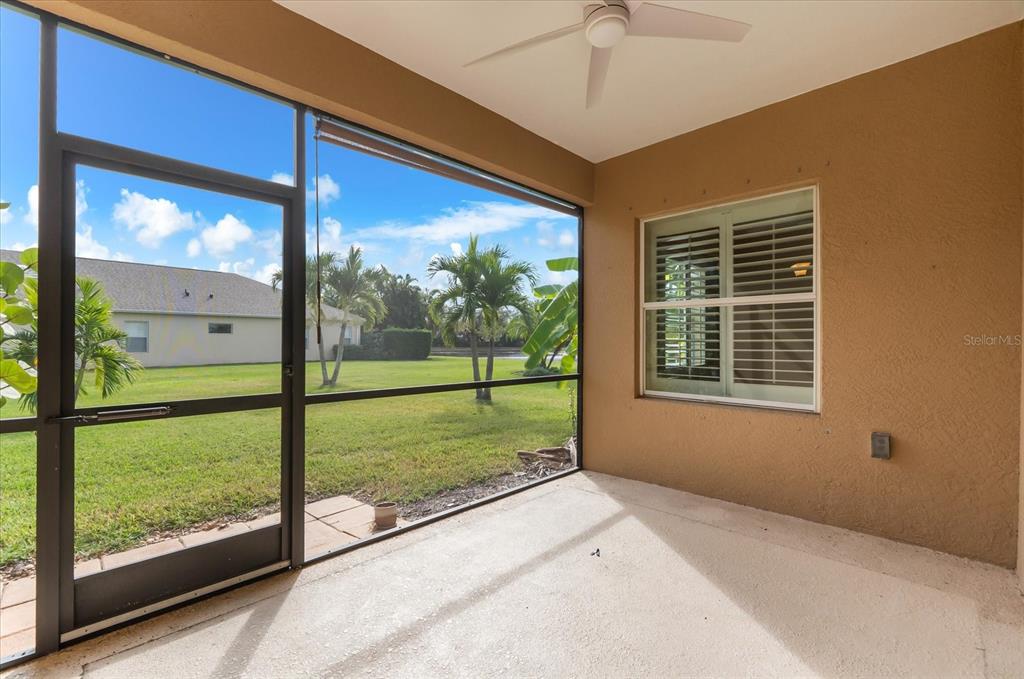 4326 Forest Creek Trail Parrish, FL 34219 - Photo 20 of 73 a view of backyard with a large window