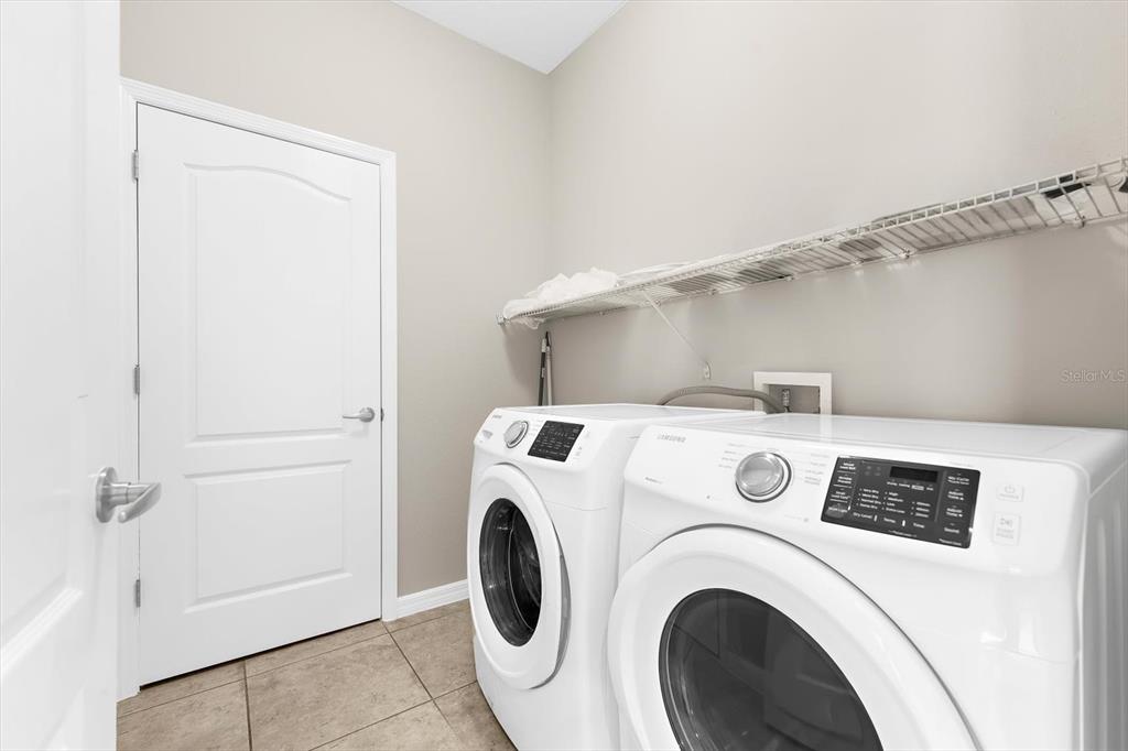 4326 Forest Creek Trail Parrish, FL 34219 - Photo 40 of 73 a utility room with dryer and washer