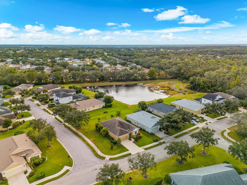 4326 Forest Creek Trail Parrish, FL 34219 - Photo 51 of 73 an aerial view of residential houses with outdoor space